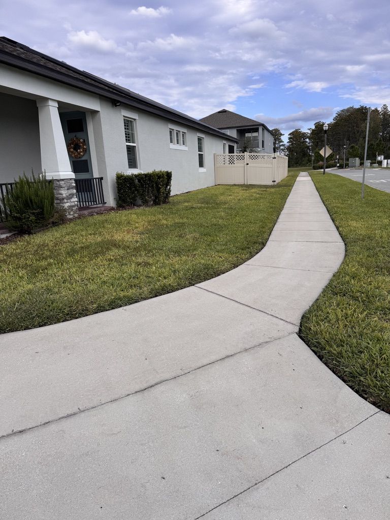 Pressure washing driveway and exterior surfaces