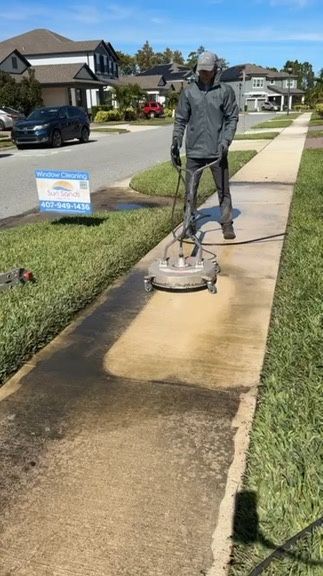 Pressure washing driveway and exterior surfaces