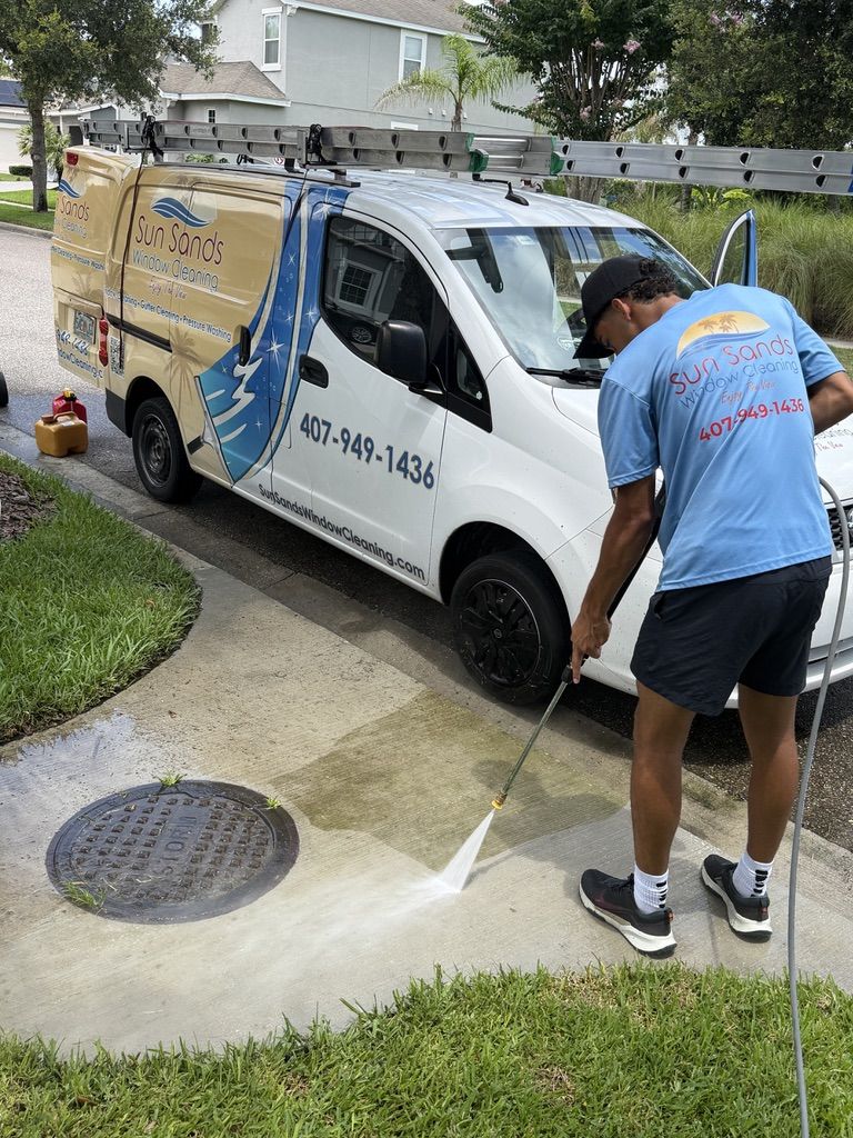 Pressure washing driveway and exterior surfaces