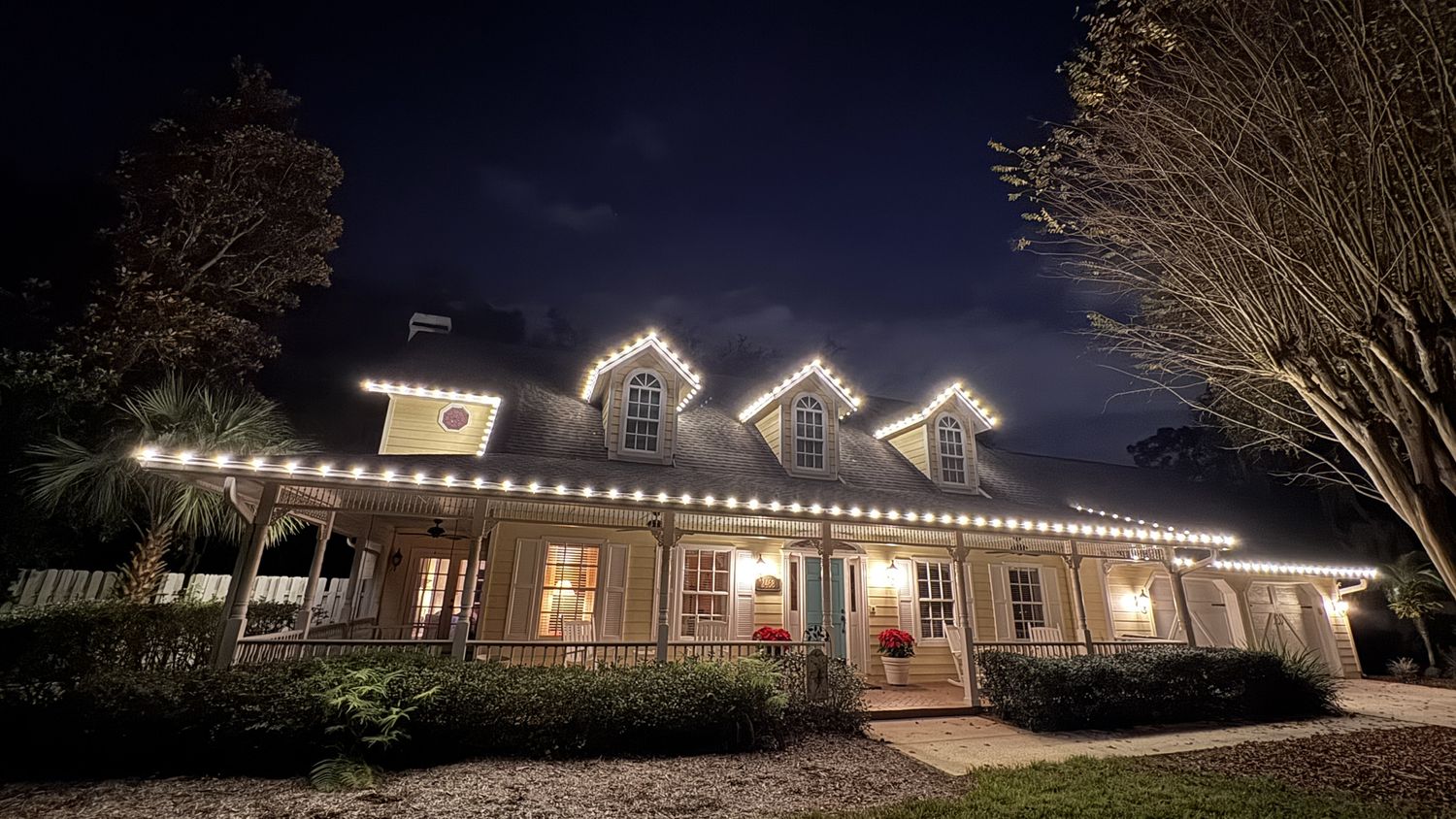 Home with permanent holiday lighting installed by Sun Sands