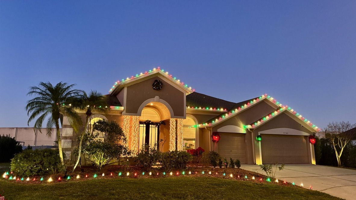 Home with permanent holiday lighting installed by Sun Sands