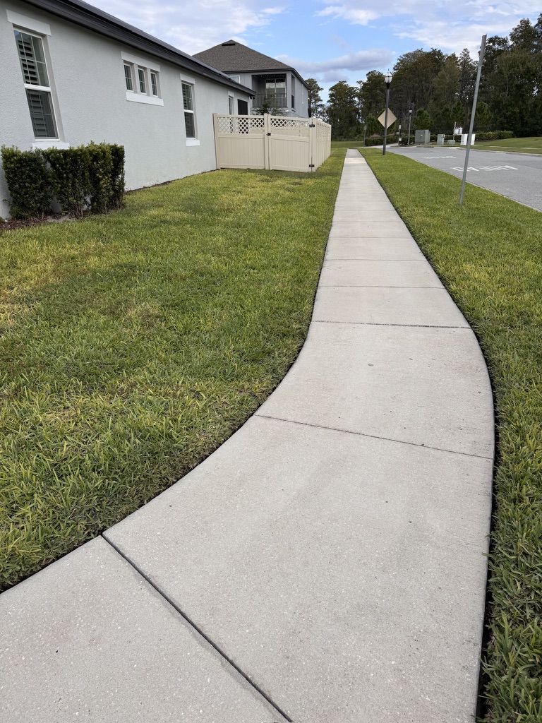 Pressure washing driveway and exterior surfaces