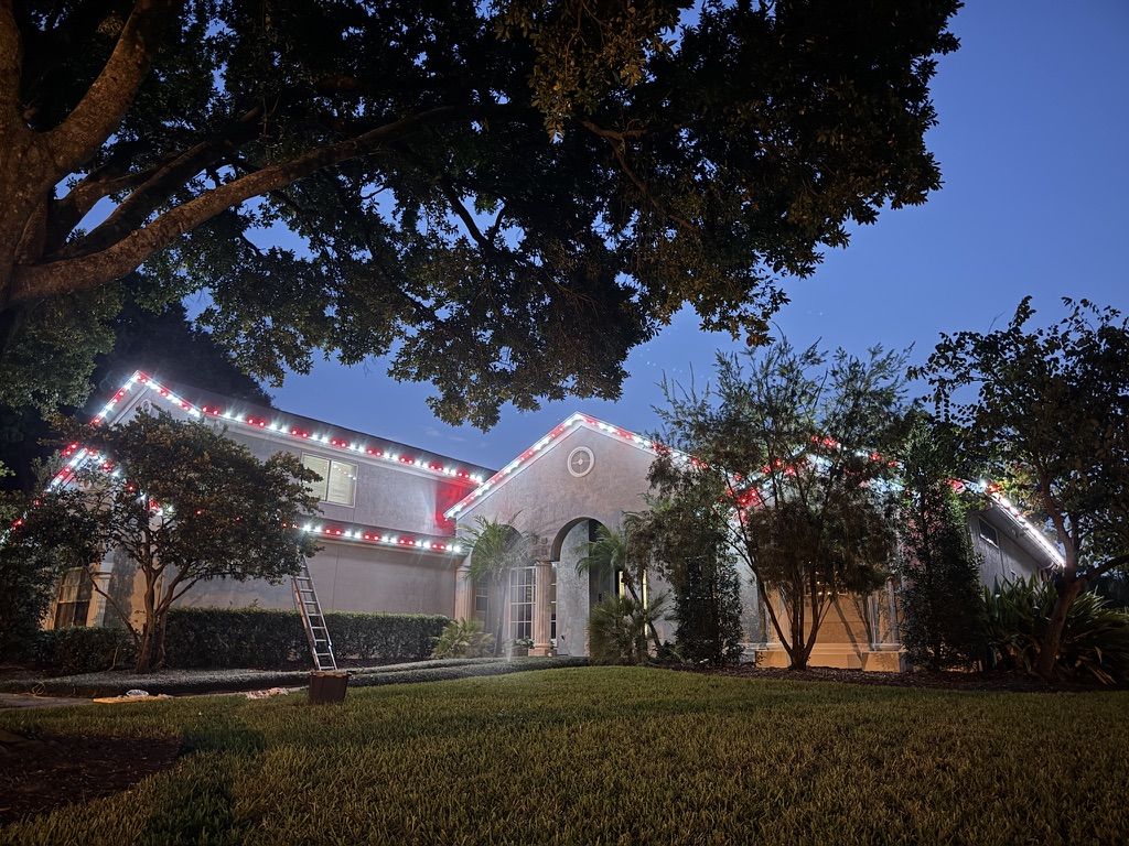 Home with permanent holiday lighting installed by Sun Sands