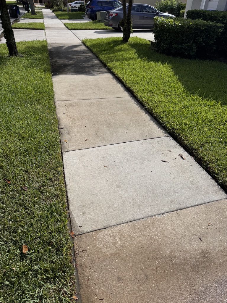 Pressure washing driveway and exterior surfaces